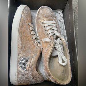 Brusque New in box. Rose gold tennis shows. Women’s size 10.5